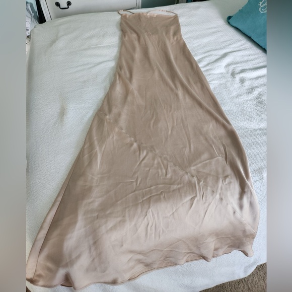 Selling this Show Me Your MuMu bridesmaid dress. Champagne. Price: $60 - Picture 7 of 8